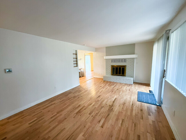 Living room with wood burning fireplace - 30126 2nd Ave SW