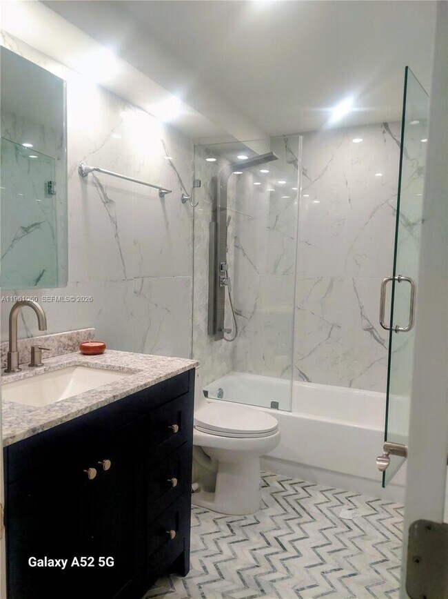 Building Photo - 5005 Collins Ave