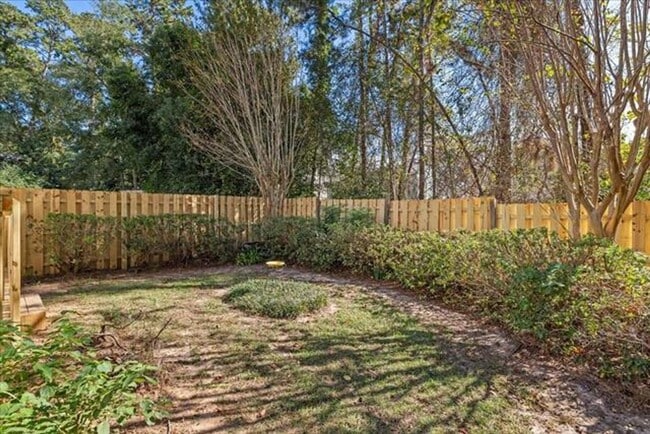 Building Photo - East Tallahassee Brick Townhome With One Car Garage