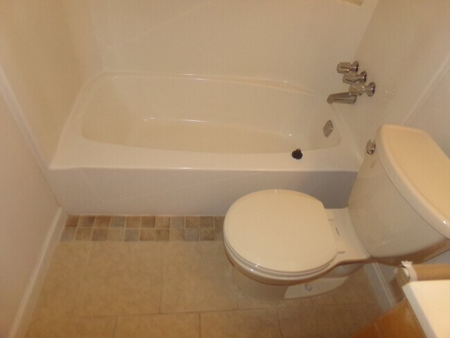 Building Photo - 2BR/1BA Milton Duplex with Huge Fenced Backyard, Tile Flooring Throughout & Convenient Access to ...