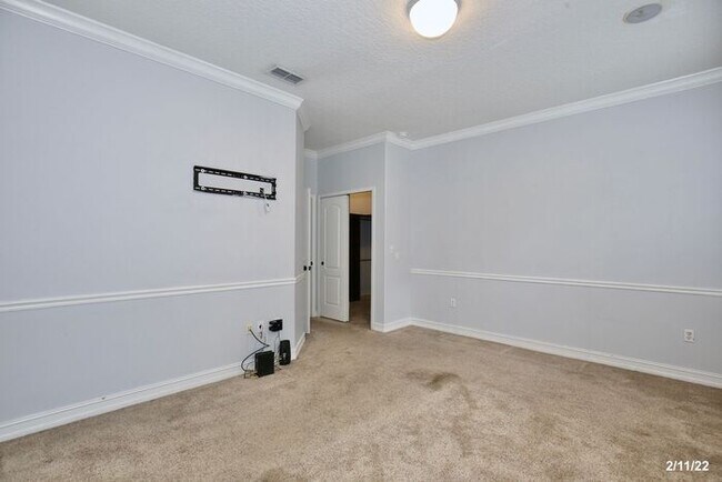 Building Photo - Luxurious 4/3 Waterfront Home with an In-ground Spa, an In-law Suite and a 2 Car Garage in the Hi...