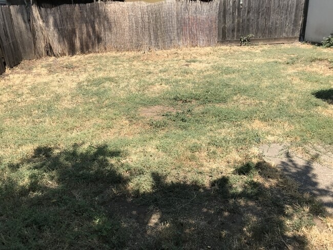 Building Photo - 3 bedroom 2 bath with bonus storage room next to Chico State with Large fenced backyard (Please r...