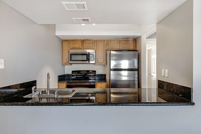 Building Photo - Upgraded Condo with Elegant Features and Convenient Location