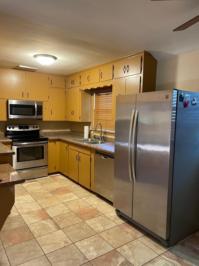 Building Photo - Spacious 4-Bedroom Ranch in District 66 with Walkout Basement & Mother-in-Law Suite