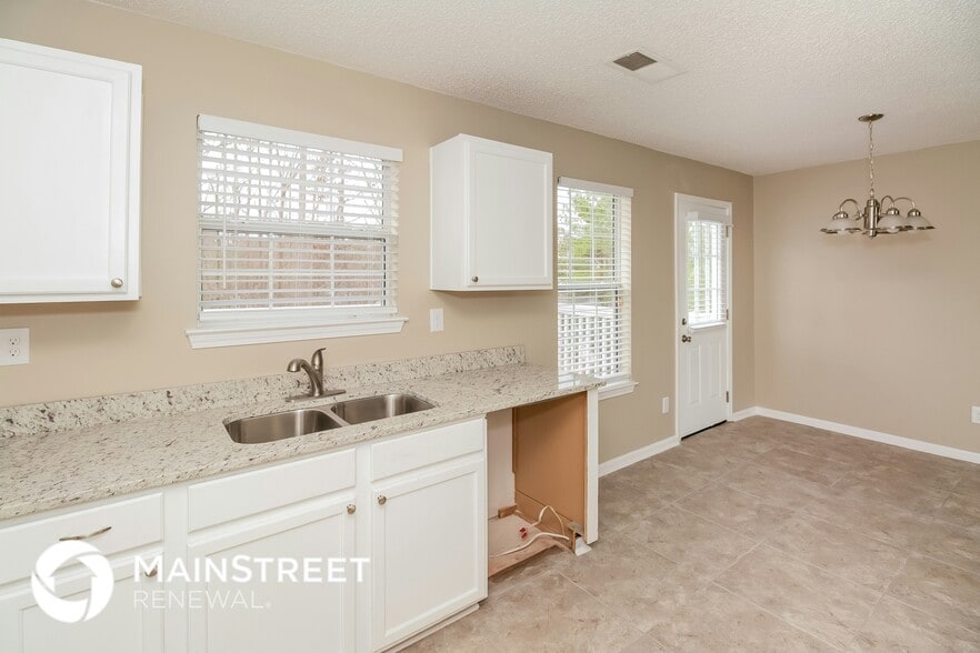 Building Photo - 7330 Teak Ct