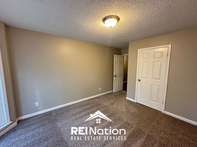 Building Photo - CORDOVA COVE CHARMER! 3BR/2BA | High Ceilings & Brick Fireplace | 2-Car Garage!