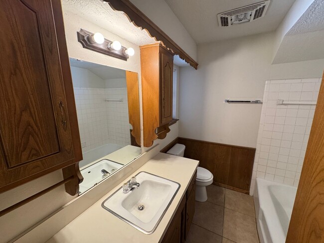 Building Photo - 3 bed, 2 bath, 2 car with 2 extra living spaces and new appliances, paint and carpet! Located clo...