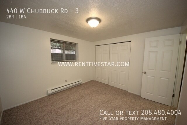 Building Photo - Charming Apartment in Chubbuck! Visit rent...