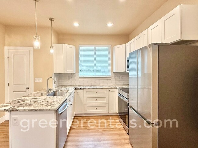 Building Photo - Modern 1-Bedroom Home with Yard, Deck & Ca...