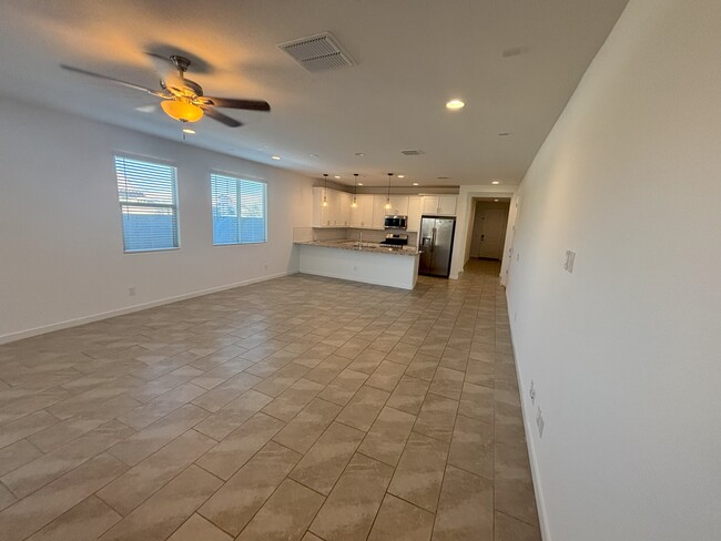 view of living and kitchen - 12350 W Wagon Wheel Dr