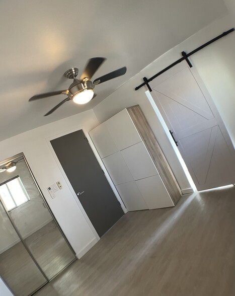 Mirrored closet doors / cabinet - 1728 E Waverly St