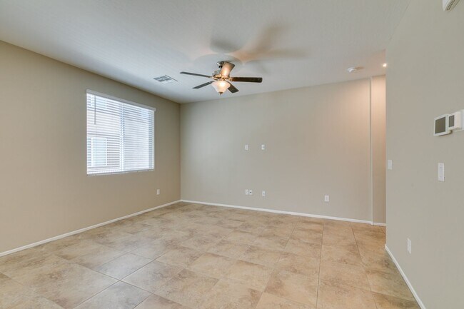 Building Photo - Spacious Townhouse with Loft & Rare 3-Car Garage!