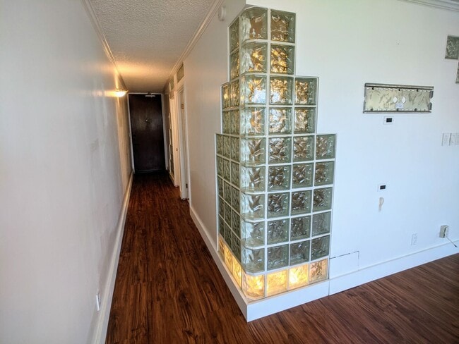 Building Photo - Sweeping Views from this partially furnished 1 Bed 1 Bath Condo w/ 1 Covered Parking