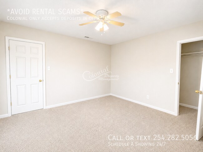 Building Photo - 5406 Boot Scootin Ct