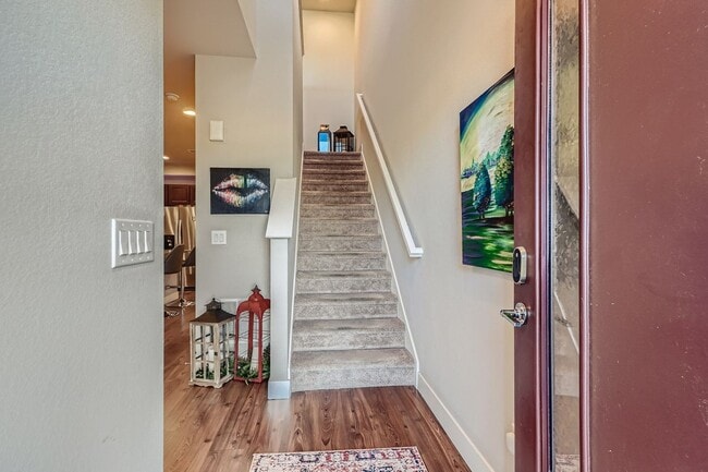 Building Photo - Spacious 3BR Townhome with Stainless Steel Appliances & 2-Car Garage