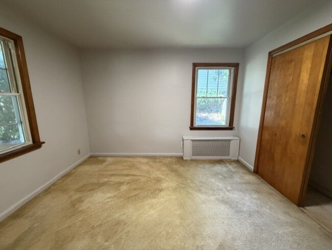 Building Photo - Three Levels of Living with 4 Bedrooms, 2 Full Bathrooms and Multiple Living Areas!