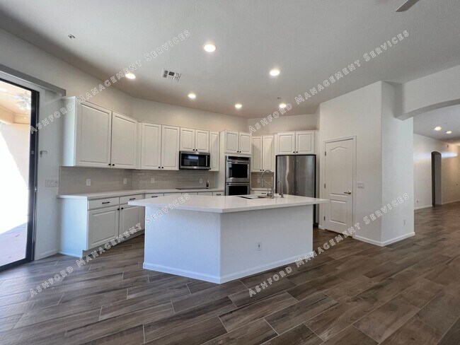 Building Photo - COME HOME TO LUXURY IN GATED GRAYHAWK GOLF...