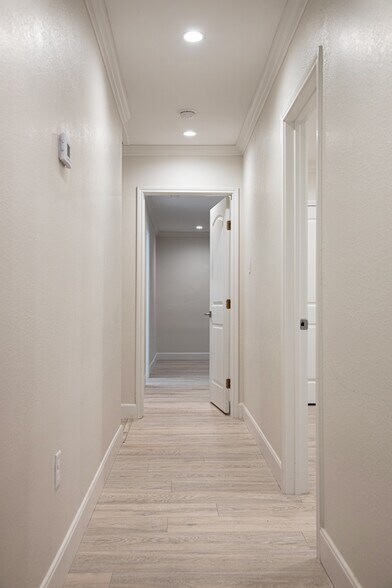 Hallway to bedrooms 1-3 - 3619 Braeswood S Blvd