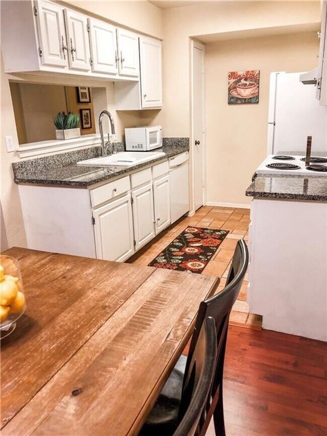 Building Photo - Corporate Furnished Two-Bedroom Condo - Utilities and Wi-Fi, From $1,825 monthly, Minimum of 3 mo...