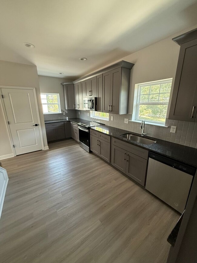 Building Photo - BRAND NEW TOWNHOMES AVALIABLE NOW