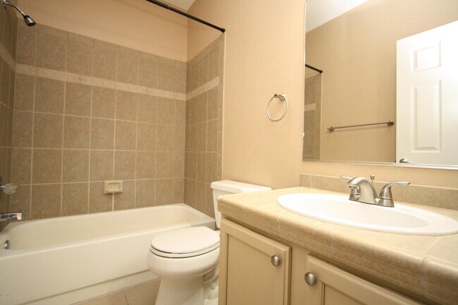 Building Photo - 6655 N Canyon Crest Dr