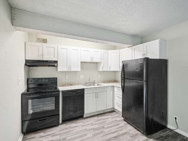 Kitchen - Village Walk Apartments