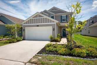 Building Photo - Spacious 4-Bedroom Home with Screened Pati...