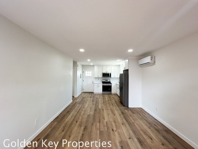 Building Photo - Welcome to your beautifully renovated sing...