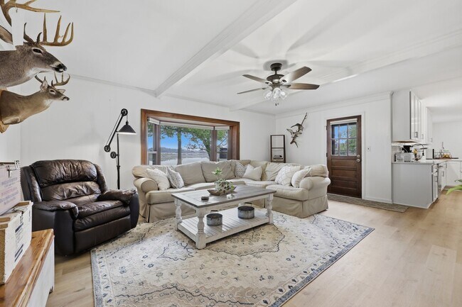 Building Photo - Stunning 4-Bedroom Waterfront Retreat with Modern Upgrades & Lake Living.