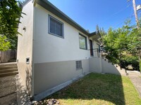 Building Photo - 2 bedroom house with a basement and carport