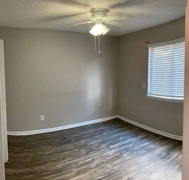 Building Photo - Just off the main road, but in walking dis...