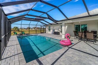 Building Photo - Cape Coral Furnished Rental 4 Bedroom 3 Ba...