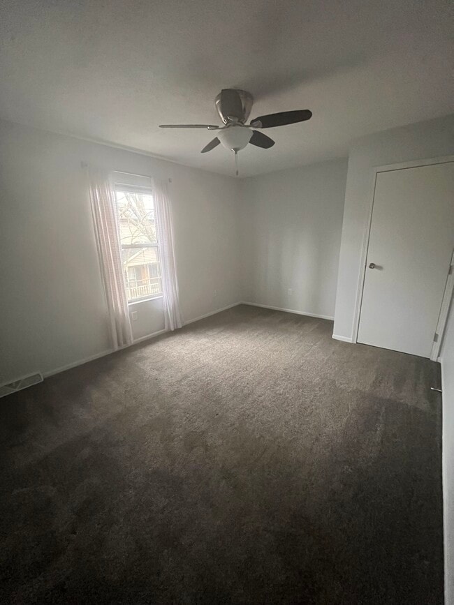 Master bedroom with overhead fan - 1172 Worthington Woods Blvd