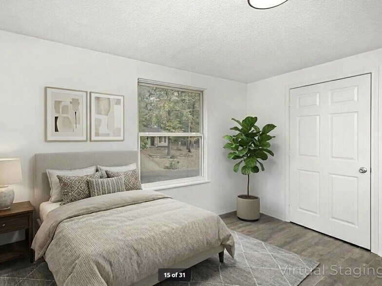 bed 1 staged - 8435 Othello Pl