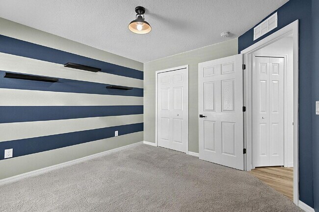 Building Photo - Modern 4-Bedroom, 3-Bath Home with Private In-Law Suite – Palm Coast, FL