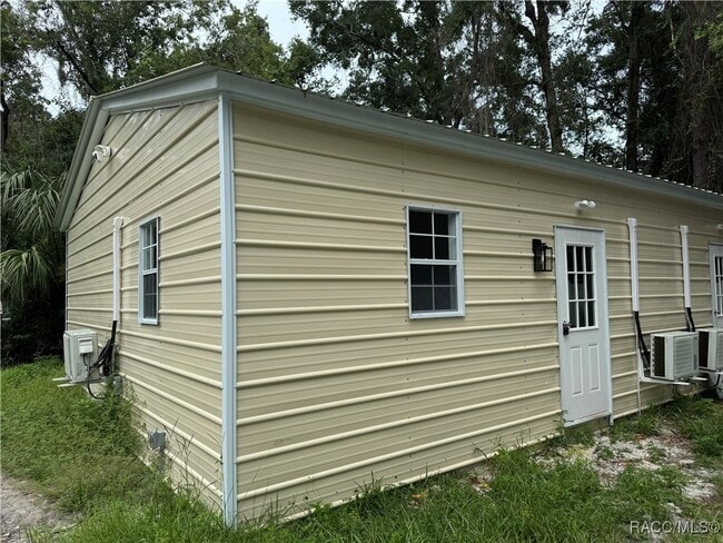 Building Photo - 6345 W Mango Ln