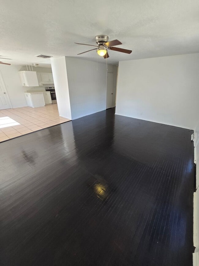 Building Photo - What!!! Less than $1.00 per square foot!!! Nice size 4 Bedroom  2 Bath with 2 living areas in the...