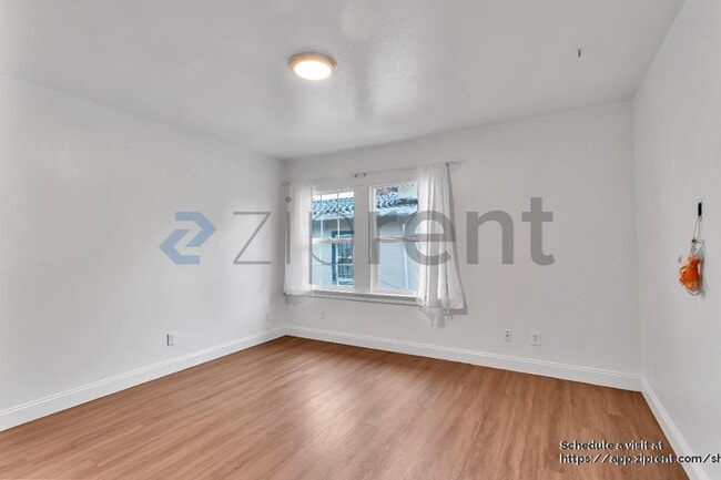 Building Photo - 1008 92nd Ave