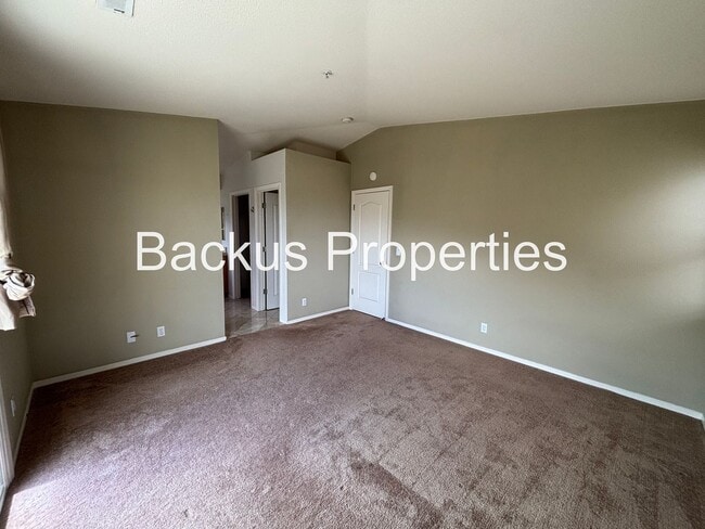 Building Photo - Great two-level home in Las Palmas II with scenic views