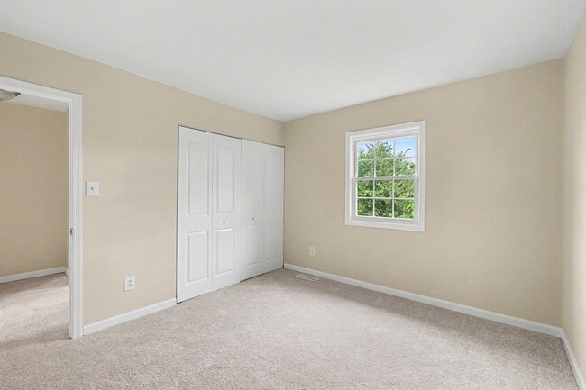 Building Photo - Updated 2BR Townhome Minutes from Central Park & Mary Washington Hospital!