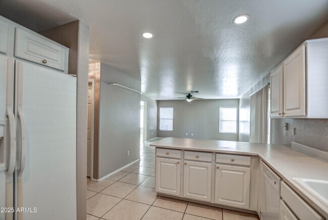 Building Photo - 6660 E Riverdale St