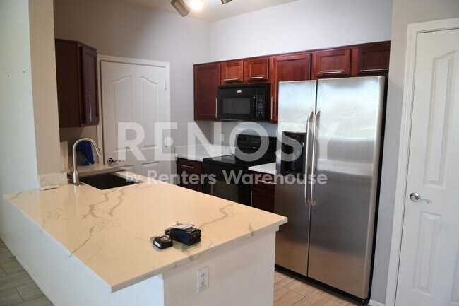 Building Photo - Price Improvement! Resort-Style Condo Living – Self-Tour with Rently!