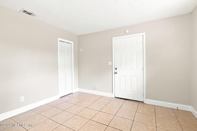 Building Photo - 6813 Tinkerbell Ln