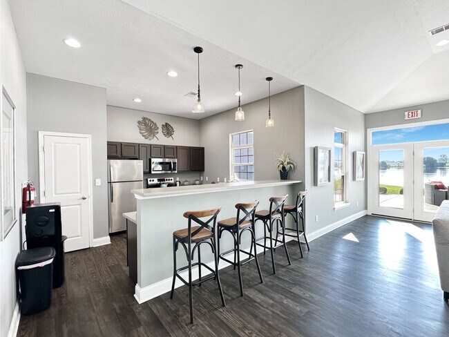 Building Photo - Luxe 1-Bedroom Haven: Serene Lakeside Livi...