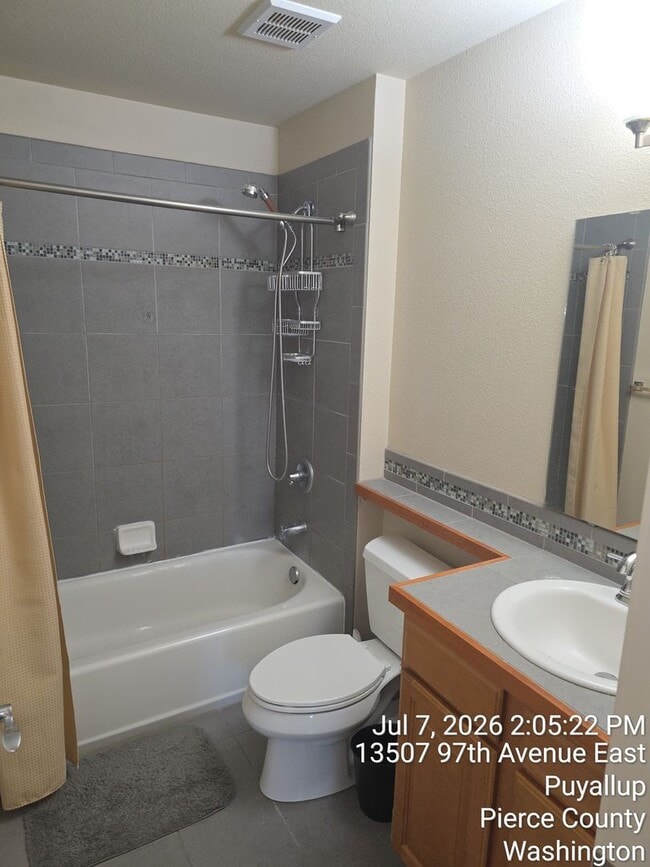 Building Photo - Trio Residences Puyallup condo - 2 bedroom, 2 bathroom with 2 car garage located in gated communi...