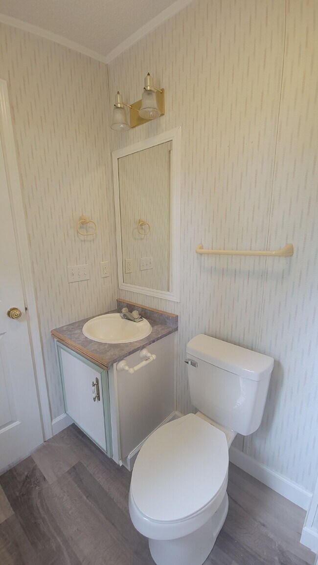 Building Photo - " 2-Bed, 2-Bath Mobile Home Retreat in Tan...
