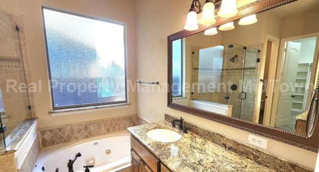 Building Photo - Well-Planned 4BR/3BA—Space for Guests, Off...