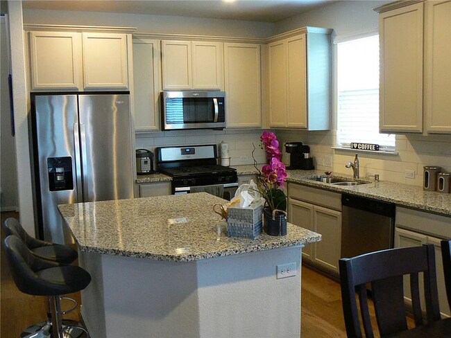 Building Photo - Coming Soon 4BR/2.5BA w/ Fenced Yard + Assigned Parking in Round Rock, TX