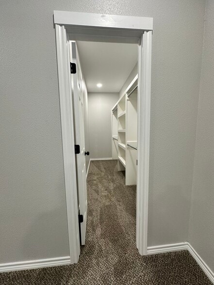 LARGE MASTER WALK-IN CLOSET - 107 S Bois D Arc St
