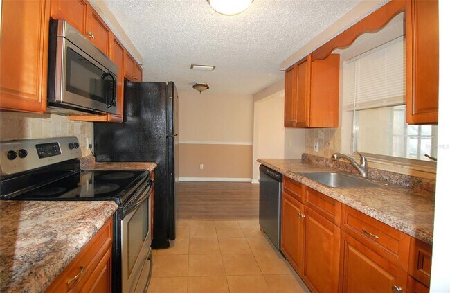 Building Photo - 7814 Topay Ln